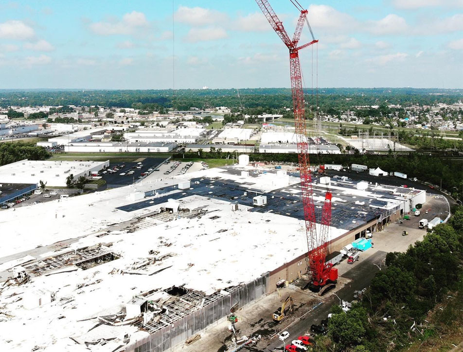 Aerial view of a construction crane at a damaged work site. 
