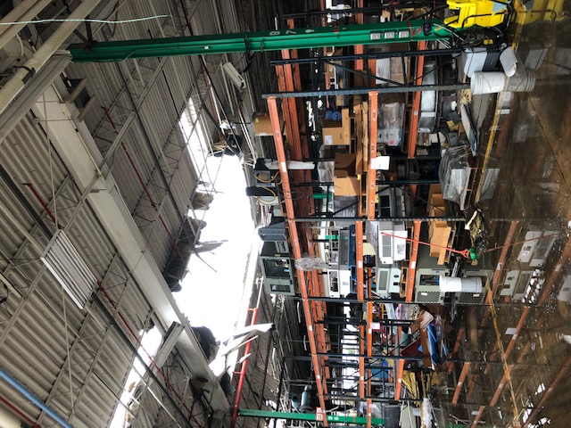 Collapsed roof and water damage in a warehouse 