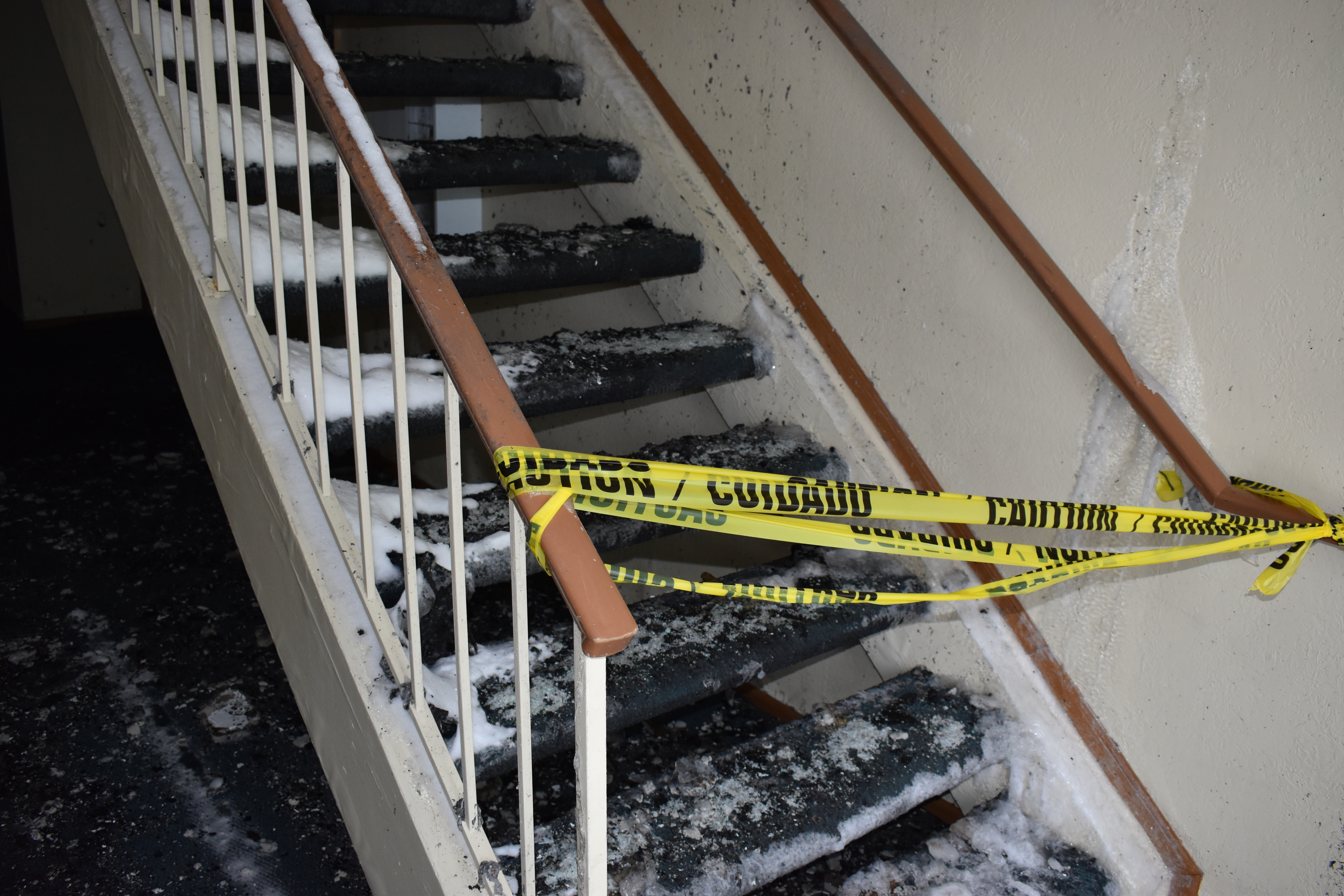 Damaged apartment building stairwell 